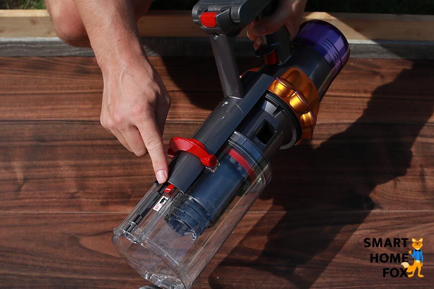 Lever for removing the container